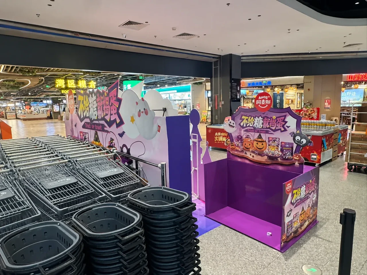 Opposite rear view of the Halloween promotion zone showing the back of the backdrops and the open display unit
